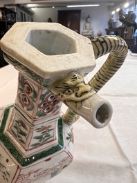 A rare Chinese famille verte puzzle jug with a wooden cover, Kangxi