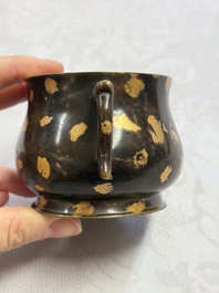 A Chinese gold-splashed bronze censer with two handles, Xuande mark, 18th C.