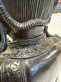 A fine Chinese bronze figure of Bodhisattva holding a ruyi, Ming