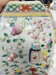 A pair of Chinese famille rose 'Antiquities' vases and covers, 19th C.
