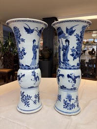 A pair of large Chinese blue and white 'Gu' vases with elegant ladies and playing boys, Kangxi