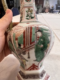 A rare Chinese famille verte puzzle jug with a wooden cover, Kangxi