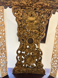 An exceptional Vietnamese gilt-lacquered wood and ivory 'Dragon and Phoenix' throne-shaped altar, 18/19th C.