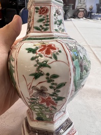 A rare Chinese famille verte puzzle jug with a wooden cover, Kangxi