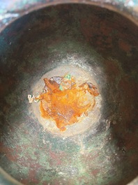 A large Chinese archaistic bronze wine vessel and cover with ram-form handles, Lei 罍, Ming