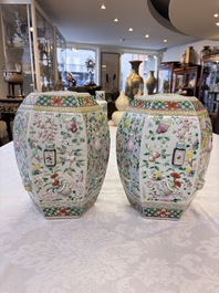 A pair of Chinese famille rose 'Antiquities' vases and covers, 19th C.
