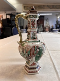 A rare Chinese famille verte puzzle jug with a wooden cover, Kangxi