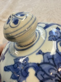 A Chinese blue and white 'Lotus Scroll' vase and cover, Ming