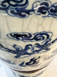 A pair of Chinese blue and white Nanking crackle-glazed 'Dragons' vases, 19th C.