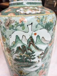 An impressive and fine pair of large Chinese famille verte 'Fishermen and Antiquities' rouleau vases, seal marks, Kangxi