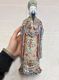 A rare Chinese wucai figure of a dignitary, late Ming/Transitional period