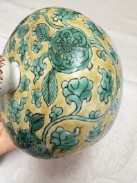 A rare pair of Chinese famille verte yellow-ground 'Flower Scroll' covered vases, Kangxi