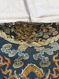 A Chinese silk blue-ground summer gauze 'Dragons' robe, 19th C.