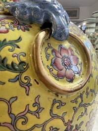 A pair of large Chinese famille rose yellow-ground 'Hu' vases with narrative design, Qianlong mark, Republic