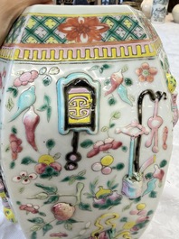 A pair of Chinese famille rose 'Antiquities' vases and covers, 19th C.