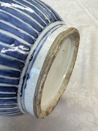 A Chinese blue, white and copper-red 'Deer' vase, 19th C.