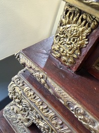 An exceptional Vietnamese gilt-lacquered wood and ivory 'Dragon and Phoenix' throne-shaped altar, 18/19th C.