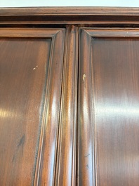A large Chinese elmwood tapered round-corner cabinet, 'Yuanjiaogui', early Qing, 17/18th C.