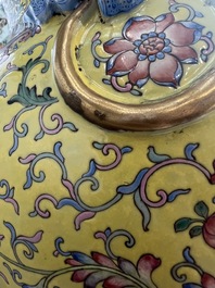 A pair of large Chinese famille rose yellow-ground 'Hu' vases with narrative design, Qianlong mark, Republic