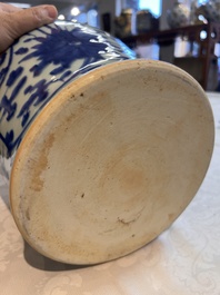 Two Chinese blue and white 'Lotus Scroll' vases and covers, Kangxi