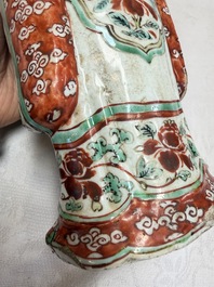 A rare Chinese wucai figure of a dignitary, late Ming/Transitional period