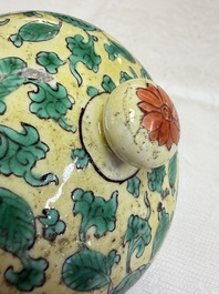 A rare pair of Chinese famille verte yellow-ground 'Flower Scroll' covered vases, Kangxi