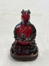 A rare complete set of 12 Chinese cherry amber 'Zodiac' figures on wooden stands, Qianlong mark, Republic