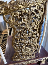 An exceptional Vietnamese gilt-lacquered wood and ivory 'Dragon and Phoenix' throne-shaped altar, 18/19th C.