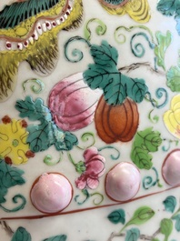 A Chinese famille rose garden seat with butterflies, flowers and fruiting branches, 19th C.