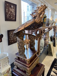 An exceptional Vietnamese gilt-lacquered wood and ivory 'Dragon and Phoenix' throne-shaped altar, 18/19th C.