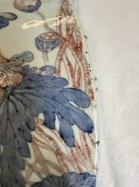 A Chinese blue, white and copper-red 'Birds among Flowering Branches' square gourd vase, 19th C.