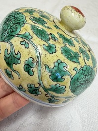 A rare pair of Chinese famille verte yellow-ground 'Flower Scroll' covered vases, Kangxi