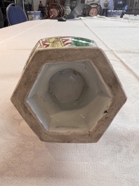 A rare Chinese famille verte puzzle jug with a wooden cover, Kangxi