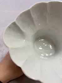 A very large Chinese Dehua blanc de Chine libation cup with a dragon, a qilin, a tiger and a crane, 18th C.