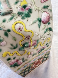 A pair of Chinese famille rose 'Antiquities' vases and covers, 19th C.