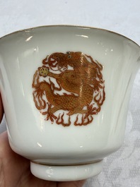 A fine Chinese iron-red gilt-decorated covered teabowl with a stand, Guangxu mark and of the period