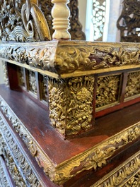 An exceptional Vietnamese gilt-lacquered wood and ivory 'Dragon and Phoenix' throne-shaped altar, 18/19th C.