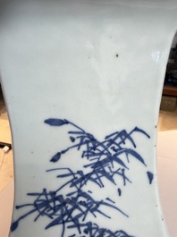 A Chinese blue, white and copper-red 'Birds among Flowering Branches' square gourd vase, 19th C.