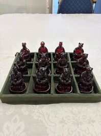 A rare complete set of 12 Chinese cherry amber 'Zodiac' figures on wooden stands, Qianlong mark, Republic