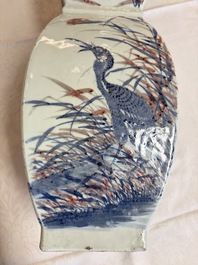 A Chinese blue, white and copper-red 'Birds among Flowering Branches' square gourd vase, 19th C.