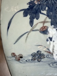 A Chinese blue, white and copper-red 'Birds among Flowering Branches' square gourd vase, 19th C.