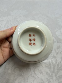A fine Chinese iron-red gilt-decorated covered teabowl with a stand, Guangxu mark and of the period