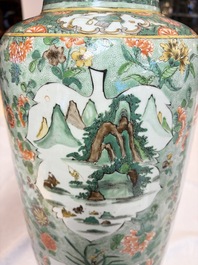 An impressive and fine pair of large Chinese famille verte 'Fishermen and Antiquities' rouleau vases, seal marks, Kangxi