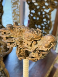 An exceptional Vietnamese gilt-lacquered wood and ivory 'Dragon and Phoenix' throne-shaped altar, 18/19th C.
