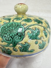 A rare pair of Chinese famille verte yellow-ground 'Flower Scroll' covered vases, Kangxi