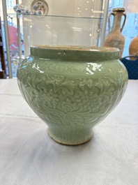 A fine large Chinese Longquan celadon 'Floral' jar, Ming