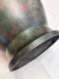 A large Chinese archaistic bronze wine vessel and cover with ram-form handles, Lei 罍, Ming