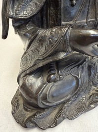 A fine Chinese bronze figure of Bodhisattva holding a ruyi, Ming