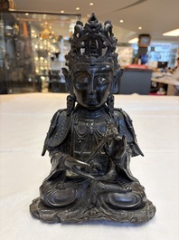 A fine Chinese bronze figure of Bodhisattva holding a ruyi, Ming