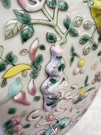 A pair of Chinese famille rose 'Antiquities' vases and covers, 19th C.
